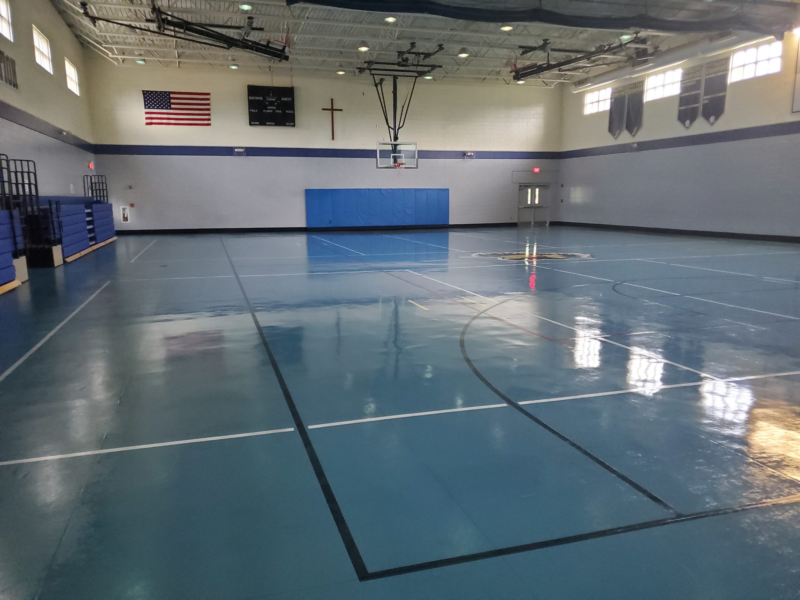 waxed gym floor by a janitorial services provider